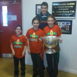 Eddie Doran (team player) with the Cup the  children of the school