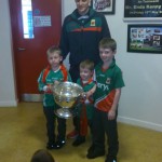 Eddie Doran (team player) with the Cup the  children of the school