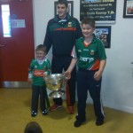 Eddie Doran (team player) with the Cup the  children of the school
