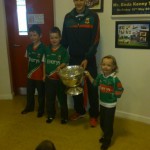 Eddie Doran (team player) with the Cup the  children of the school