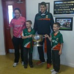 Eddie Doran (team player) with the Cup the  children of the school