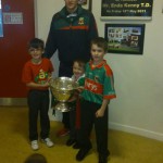 Eddie Doran (team player) with the Cup the  children of the school