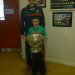 Eddie Doran (team player) with the Cup the  children of the school