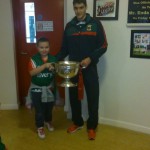 Eddie Doran (team player) with the Cup the  children of the school