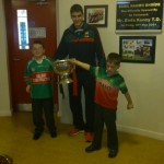 Eddie Doran (team player) with the Cup the  children of the school